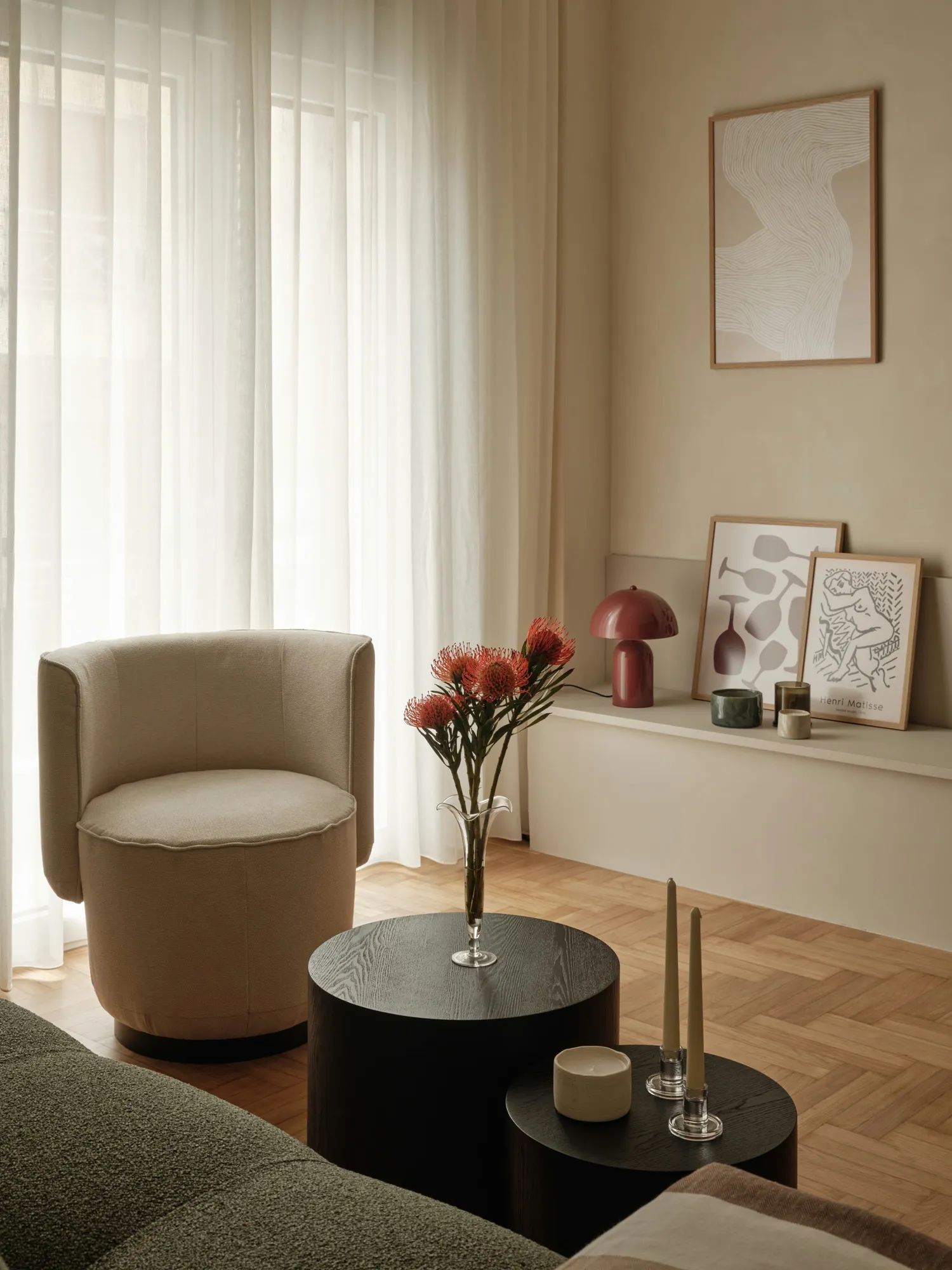 Armchair, flowers and built-in ledge in the living room