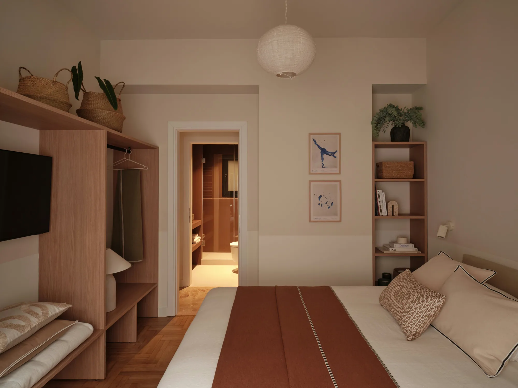 Second bedroom with timber shelving and warm red bedding