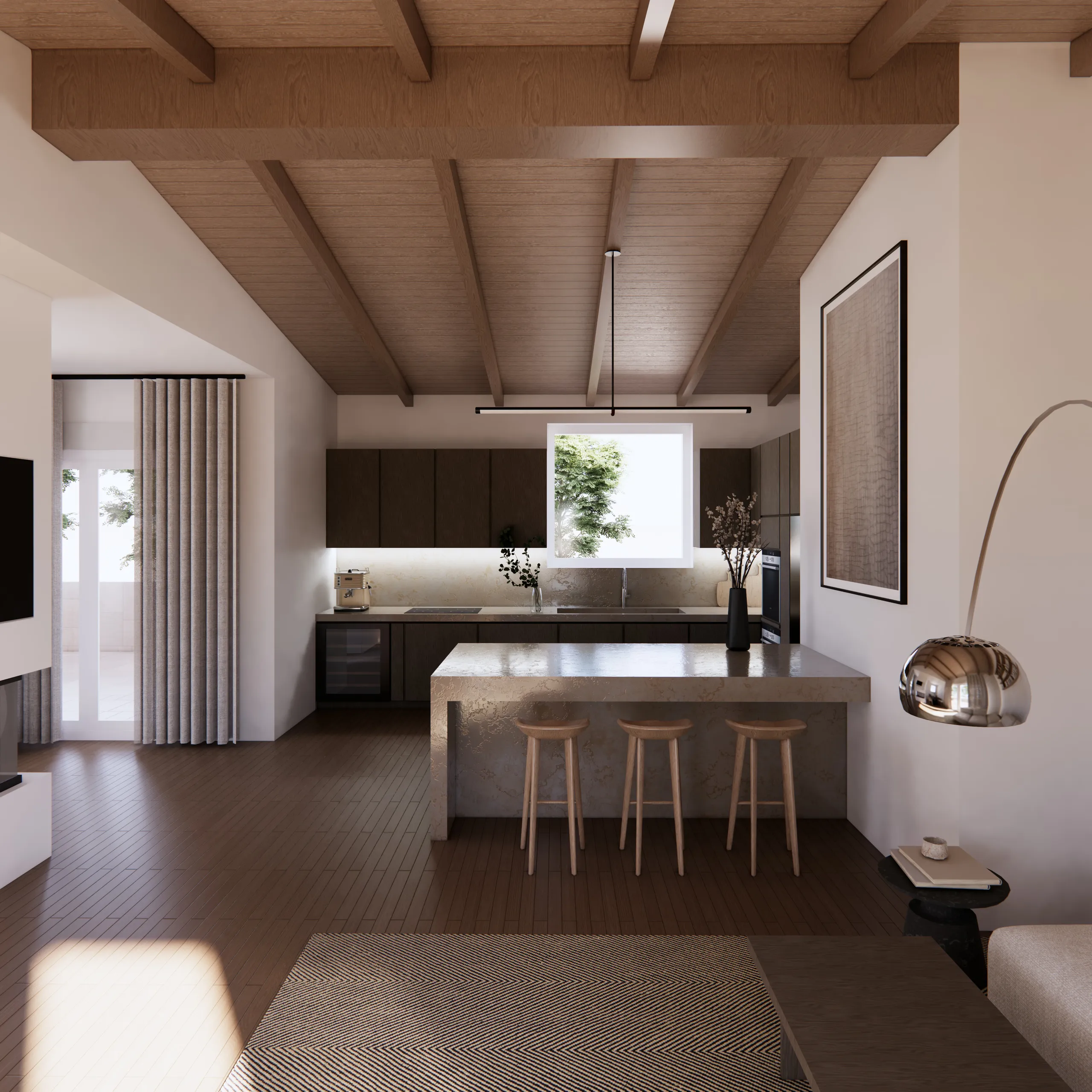 Kitchen beneath the pitched timber ceiling with a stone island and dark oak cabinetry